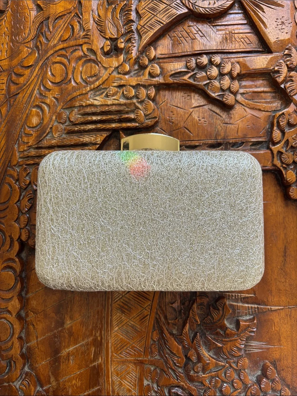 Light gold glittery clutch
